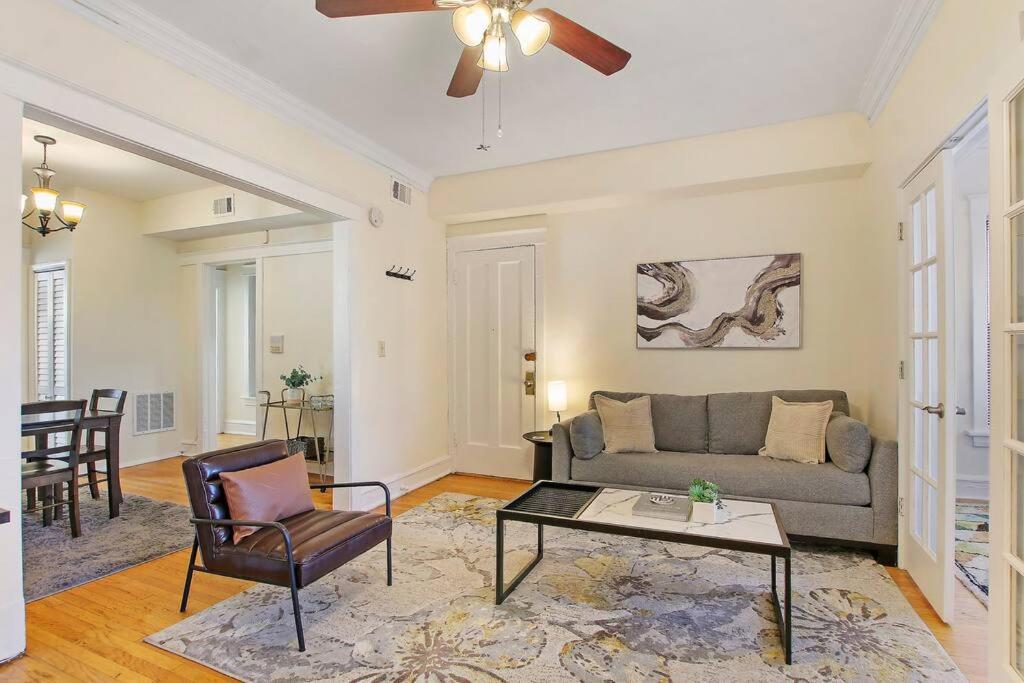 a living room with a couch and a table at Cozy and Inviting Two-Bedroom Apartment - Sunnyside 3F in Chicago