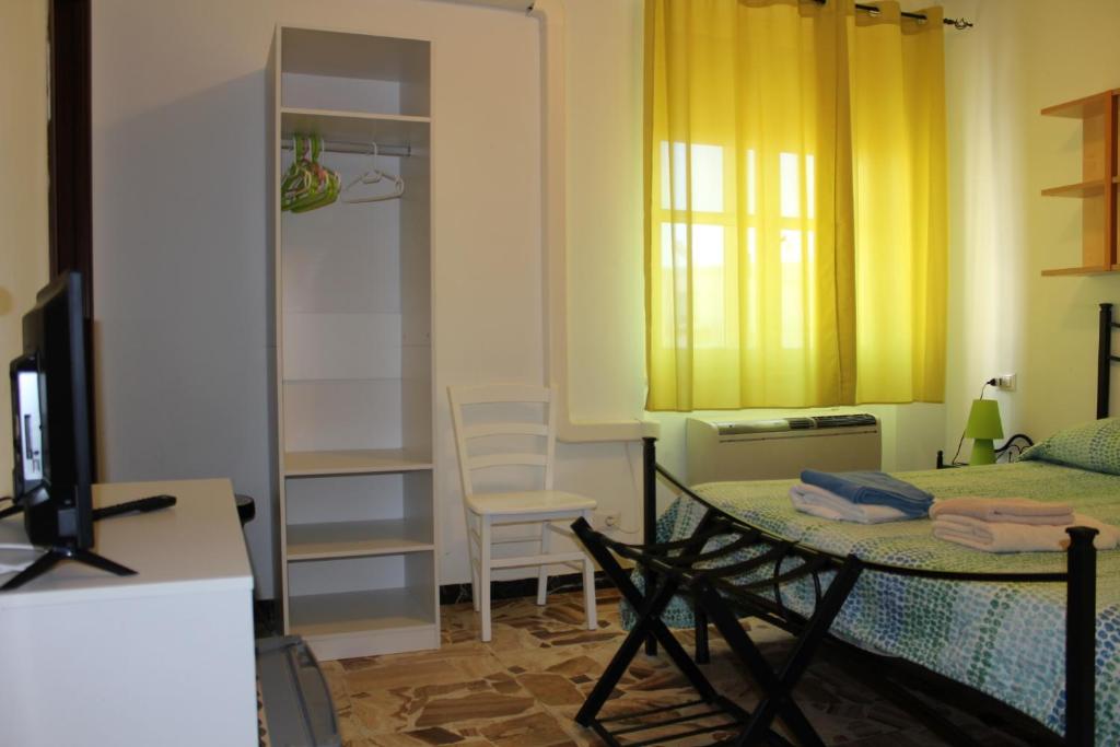 A television and/or entertainment centre at Alghero Budget