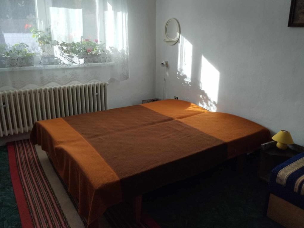 Postel nebo postele na pokoji v ubytování Apartment Natalia