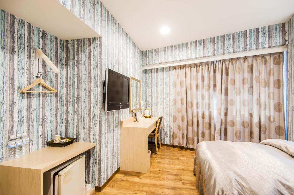 Sanduo Hotel - Тройная комната