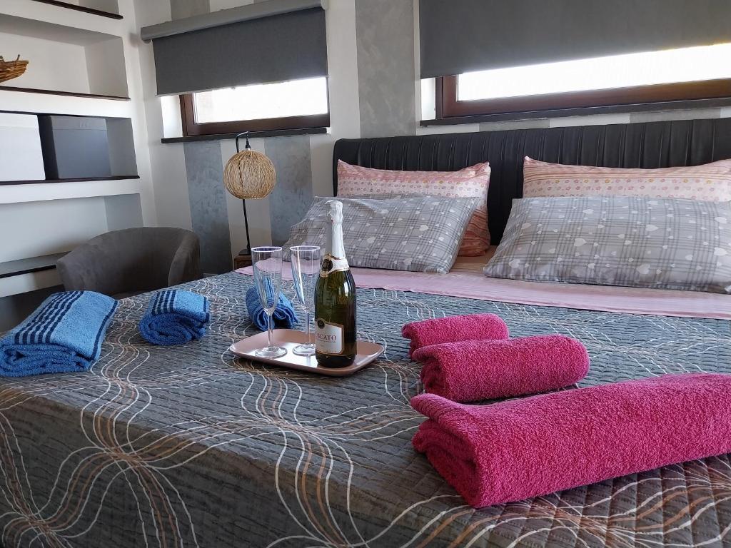 Postel nebo postele na pokoji v ubytování Luxury b&b Le Rocce