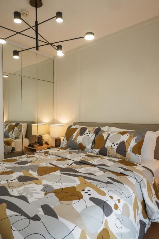 Postel nebo postele na pokoji v ubytování Elegant, and Family-Friendly 2BR in Pine Suites