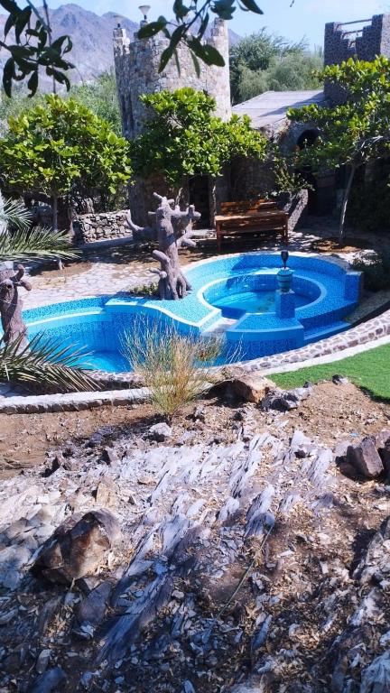 Bazén v ubytování Mughaibar Fort Resort nebo v jeho okolí