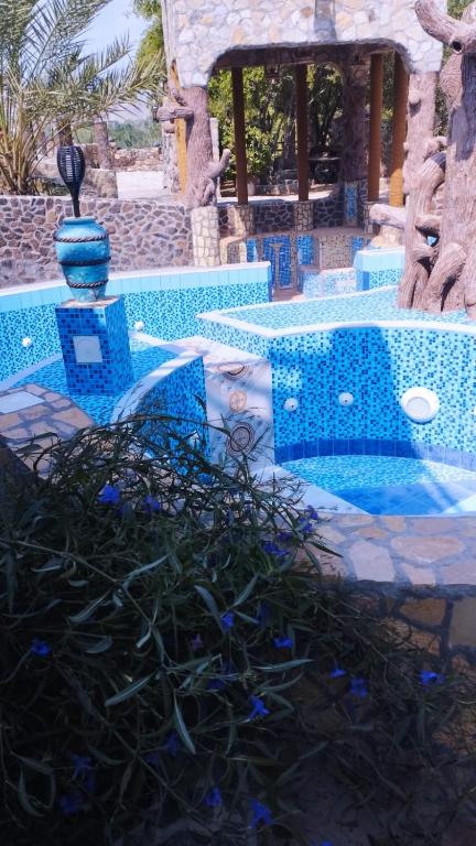 Bazén v ubytování Mughaibar Fort Resort nebo v jeho okolí