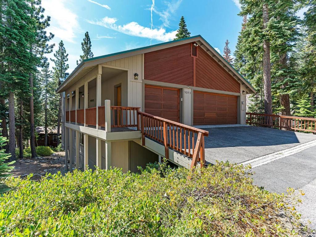 a small house with a porch and a garage at Amazing mountain setting in Incline Village