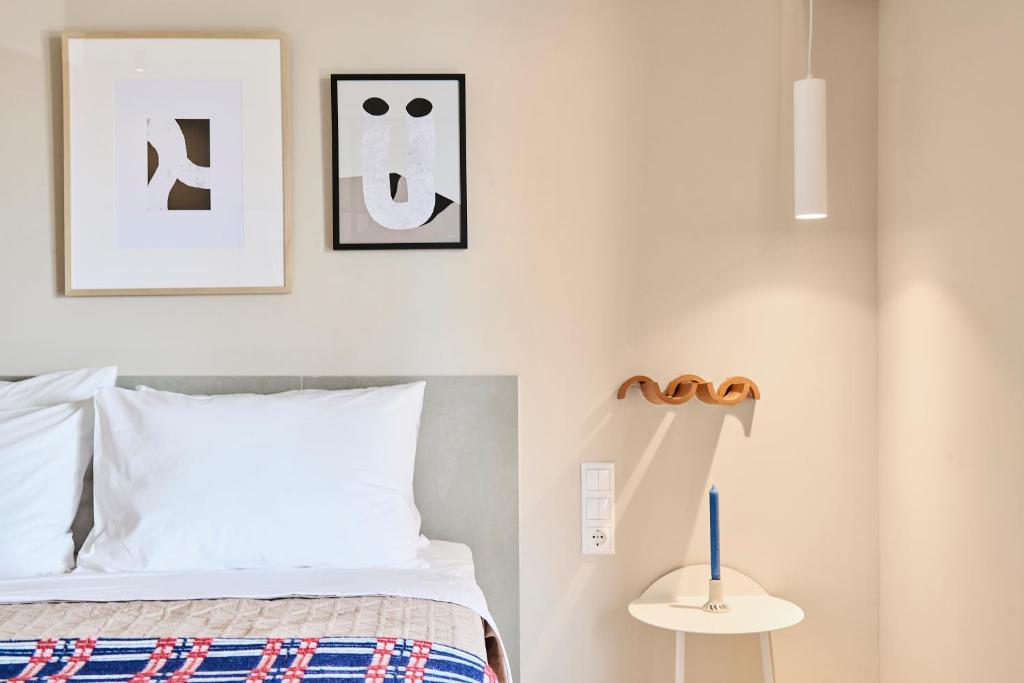 Postel nebo postele na pokoji v ubytování Skiathos Icon- Apartment 3
