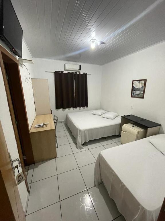 Postel nebo postele na pokoji v ubytování Hotel BLESS