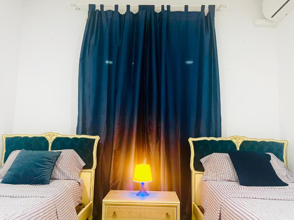 Postel nebo postele na pokoji v ubytování Art House