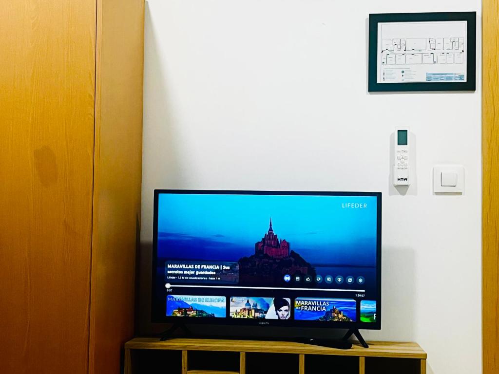 TV a/nebo společenská místnost v ubytování Art House