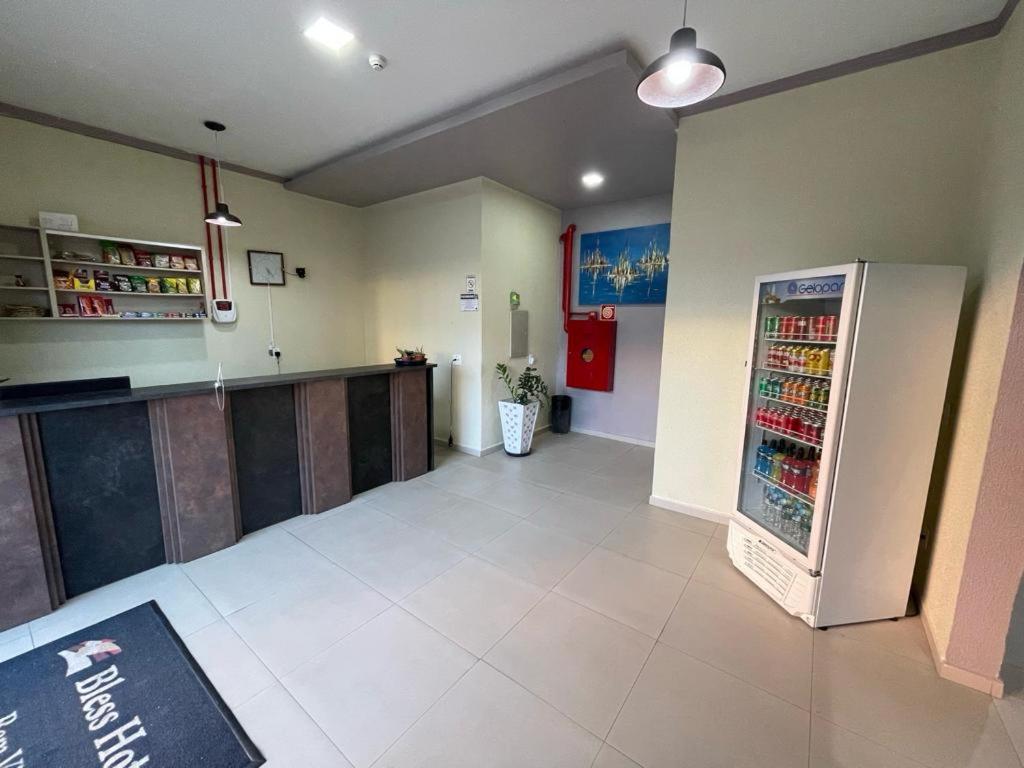 Kuchyň nebo kuchyňský kout v ubytování Hotel BLESS