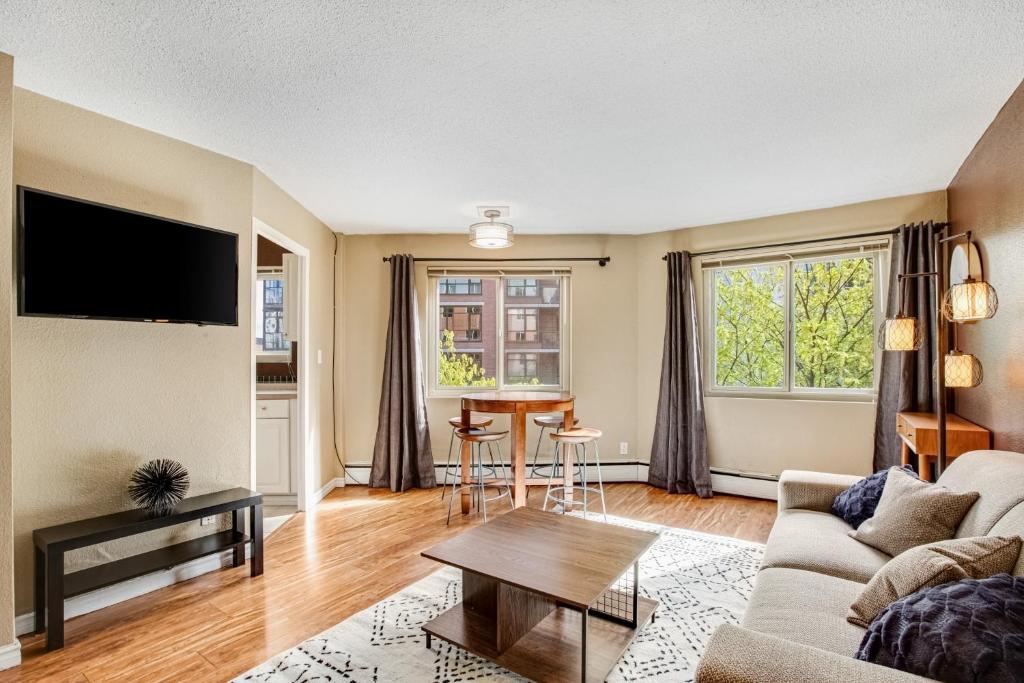 a living room with a couch and a table at Central Respite in Seattle