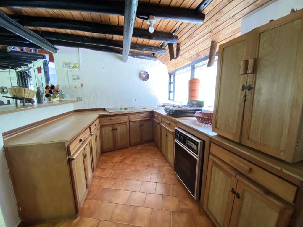 Kuchyň nebo kuchyňský kout v ubytování La Roca Glamping