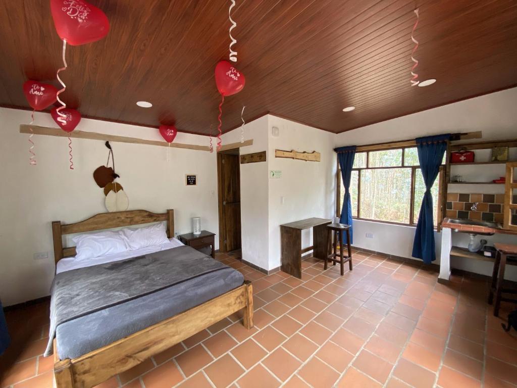 Postel nebo postele na pokoji v ubytování La Roca Glamping