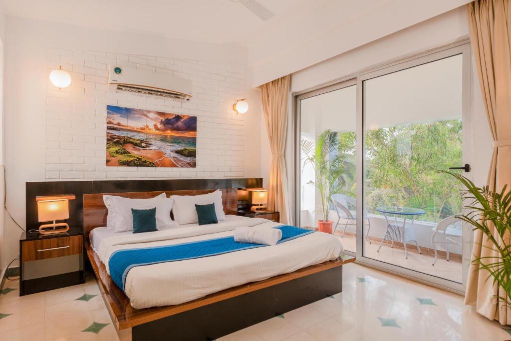 Postel nebo postele na pokoji v ubytování HideAway 2BHK Duplex Villa, North Goa (STU)