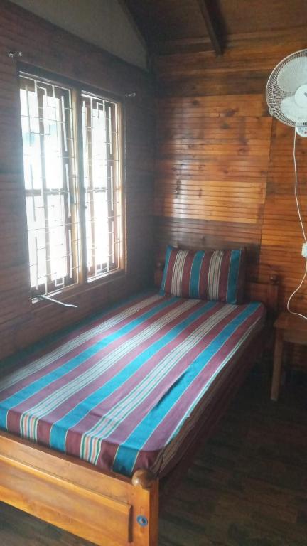 Postel nebo postele na pokoji v ubytování Alffa Guest Inn