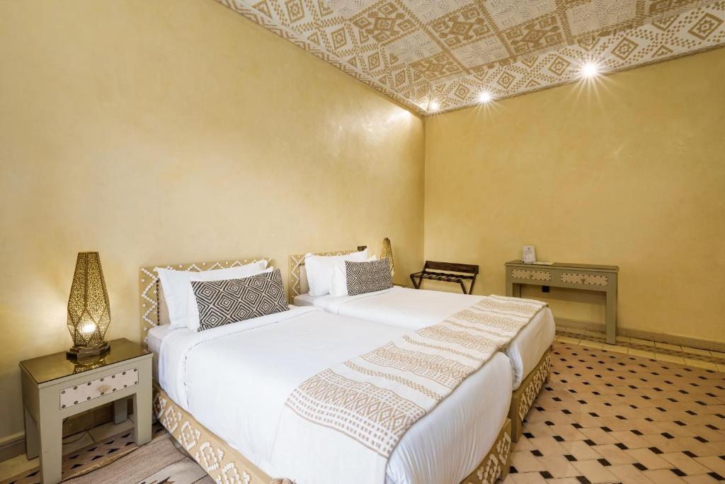 Postel nebo postele na pokoji v ubytování Albakech Boutique Hôtel & Spa