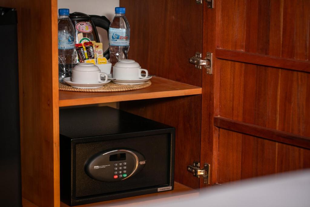 Příslušenství pro přípravu čaje a kávy v ubytování Mera Residence