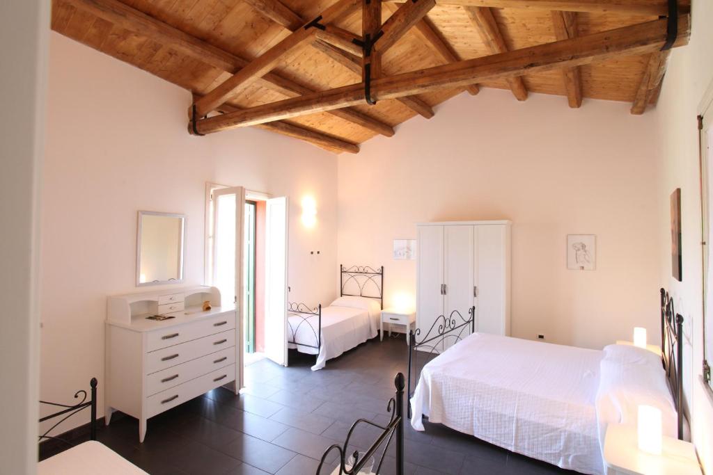 Postel nebo postele na pokoji v ubytování Reusia Holiday Home