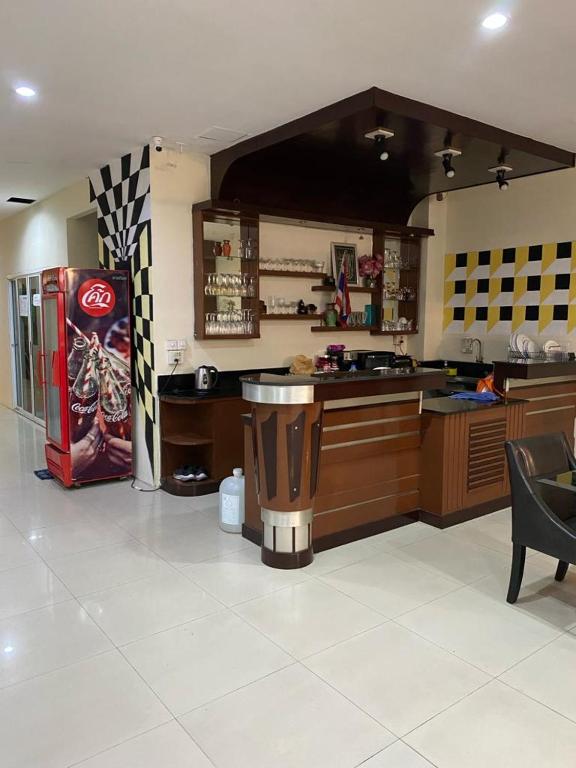 Kuchyň nebo kuchyňský kout v ubytování Lavender Patong Hotel