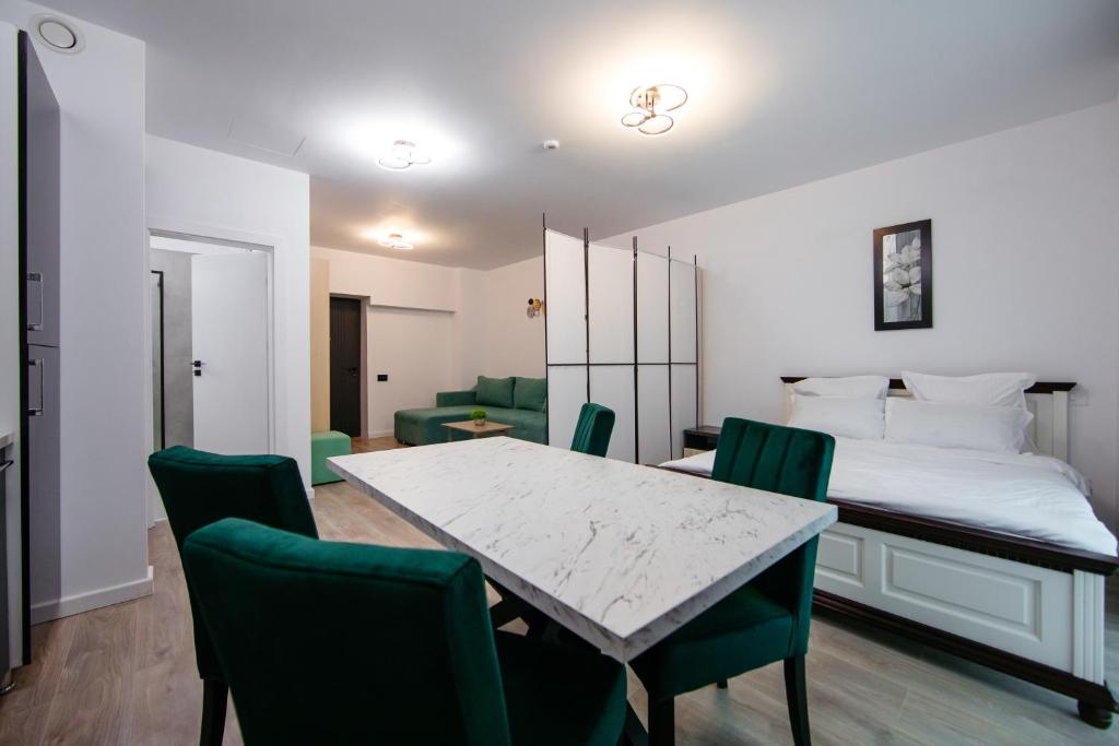 En eller flere senge i et værelse på L&V Family Studio