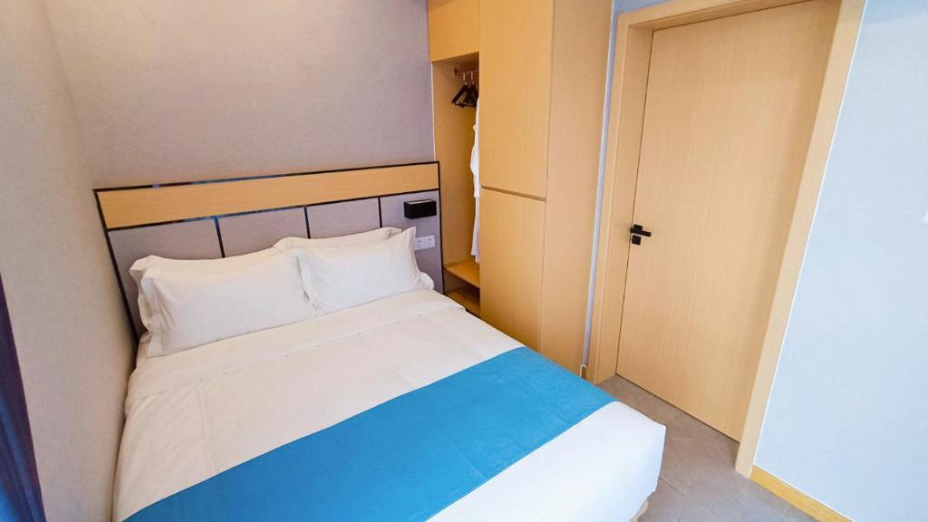 Postel nebo postele na pokoji v ubytování ARK HOTEL