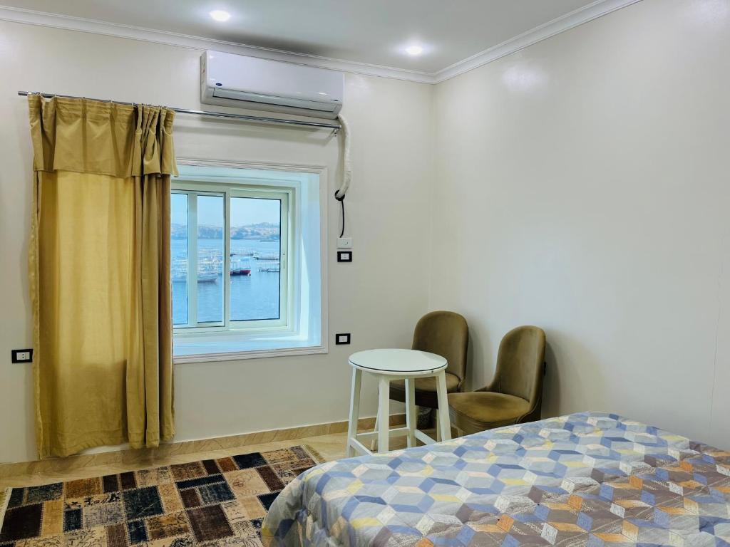 Postel nebo postele na pokoji v ubytování Wanas Kato Guest House
