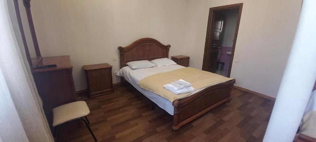 Postel nebo postele na pokoji v ubytování NEW BELLA HOTEL