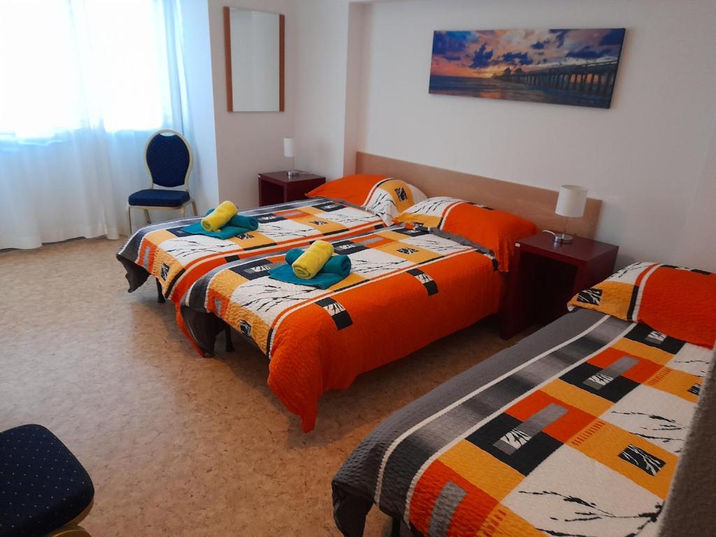 Postel nebo postele na pokoji v ubytování Garni Elisabetta