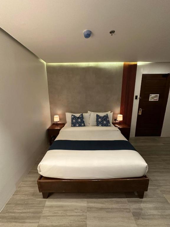 Postel nebo postele na pokoji v ubytování Coron 180 Hotel