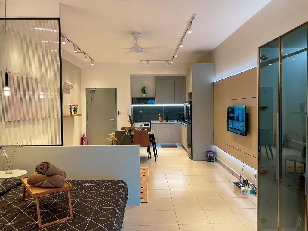 TV a/nebo společenská místnost v ubytování Netizen Cozy Suite By GUESTONIC