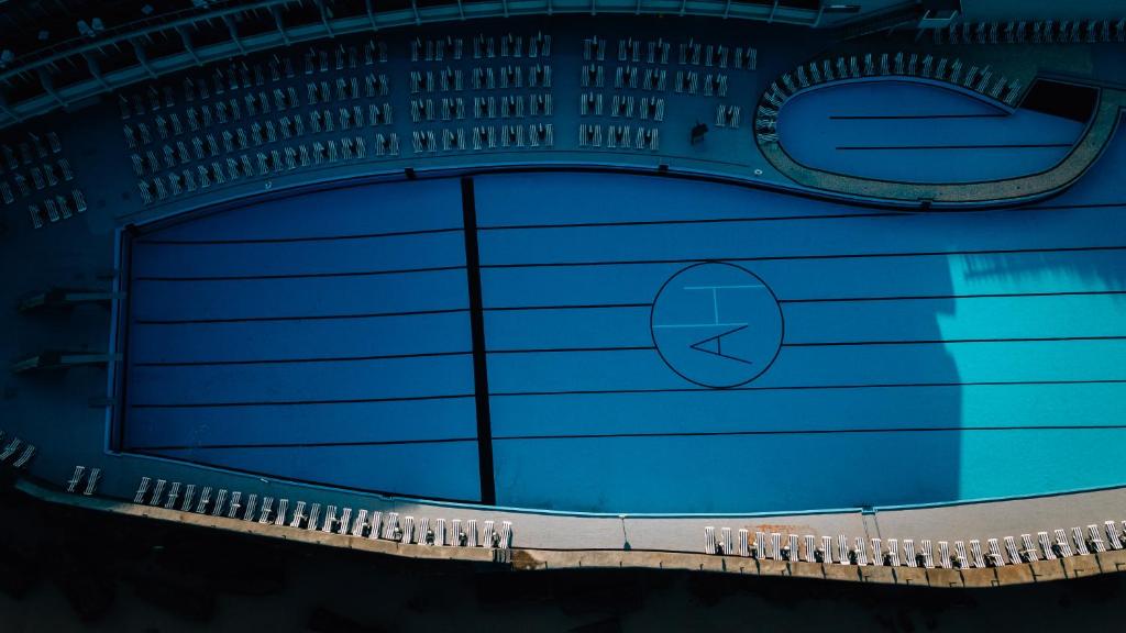 a close up of a building with a blue garage at Arribas Sintra Hotel in Sintra