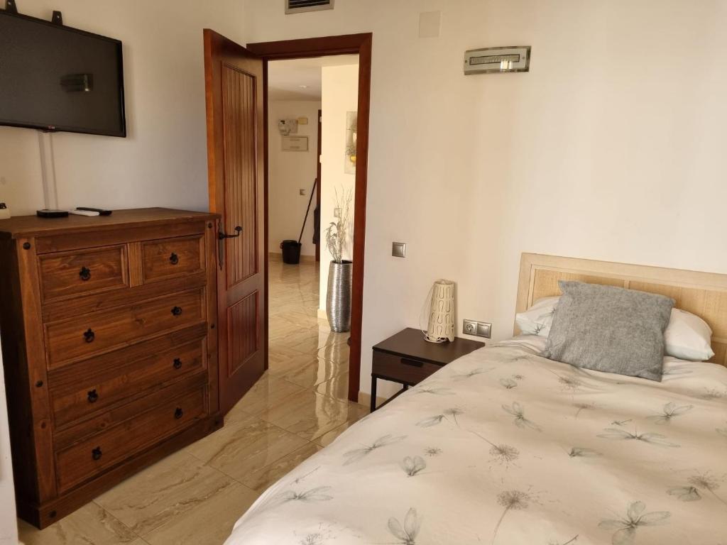A bed or beds in a room at Panorama Park, Punta Prima, 5 star Luxury 2 bedroom Apartment like no other