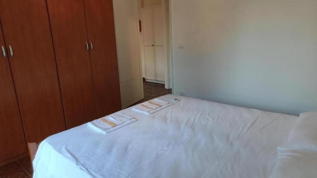A bed or beds in a room at Hannalore - By Ligooria