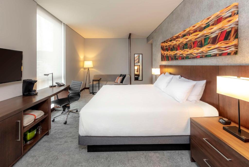 Postel nebo postele na pokoji v ubytování Hyatt Place Bogota Convention Center
