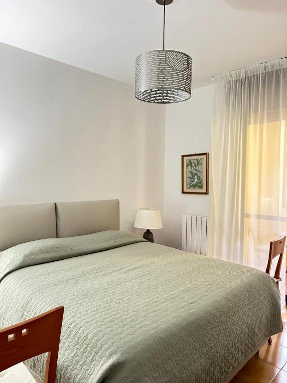 Casa vacanze 1702, con la camera matrimoniale con il bagno privato e un soggiorno comune