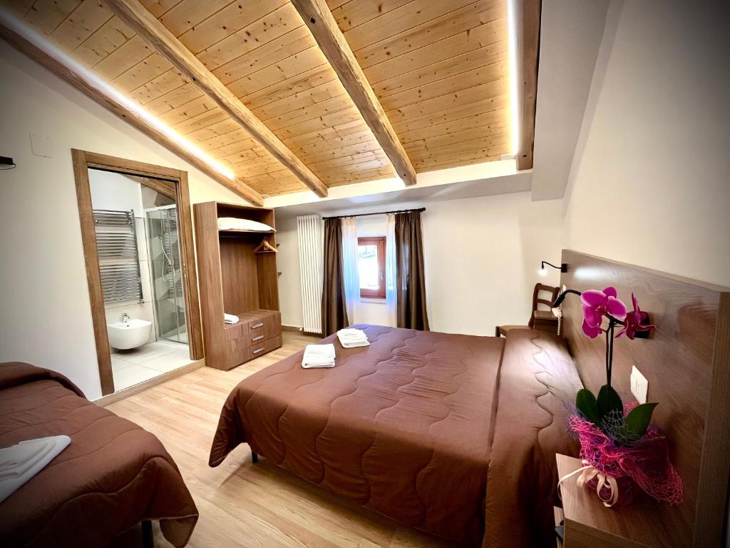Posteľ alebo postele v izbe v ubytovaní Hotel Pinguino