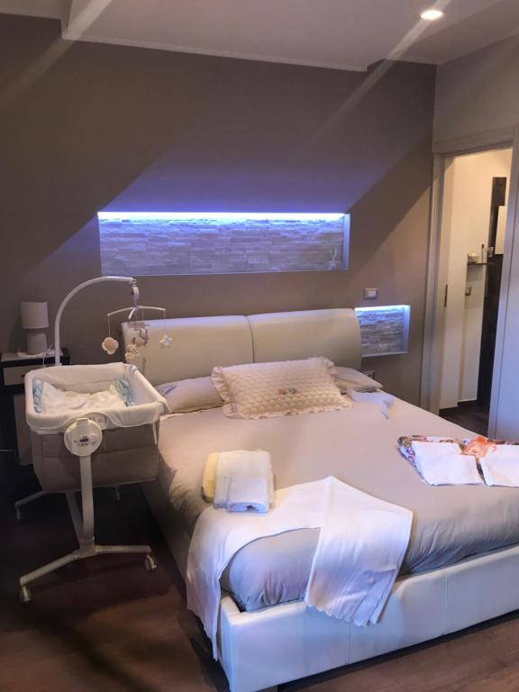 a hospital room with a bed and a window at Casa Vacanze MURANUM - B&B in Morano Calabro