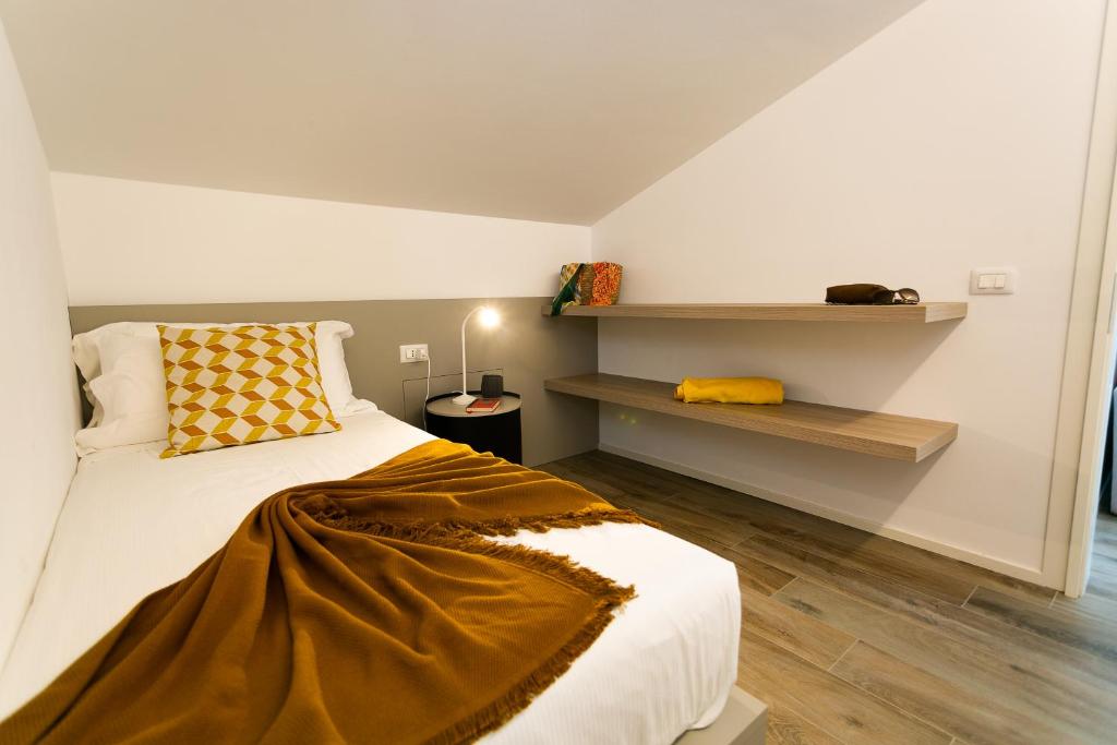 Postel nebo postele na pokoji v ubytování Casa Massaro Todeschini