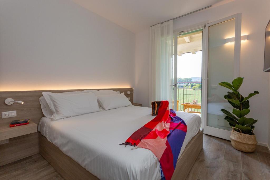Postel nebo postele na pokoji v ubytování Casa Massaro Todeschini