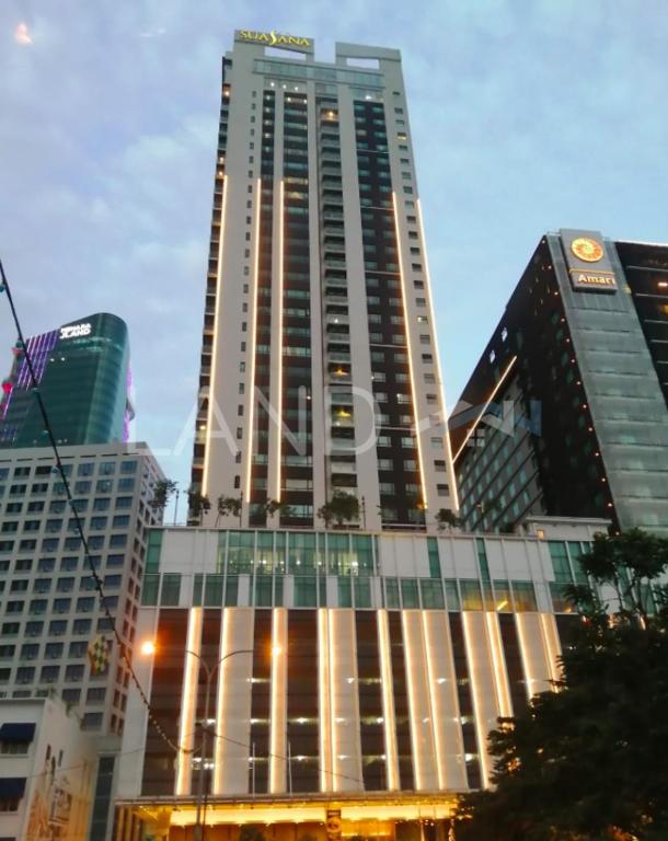 a tall building with many windows in a city at Sausana Suites D' Bliss in Johor Bahru