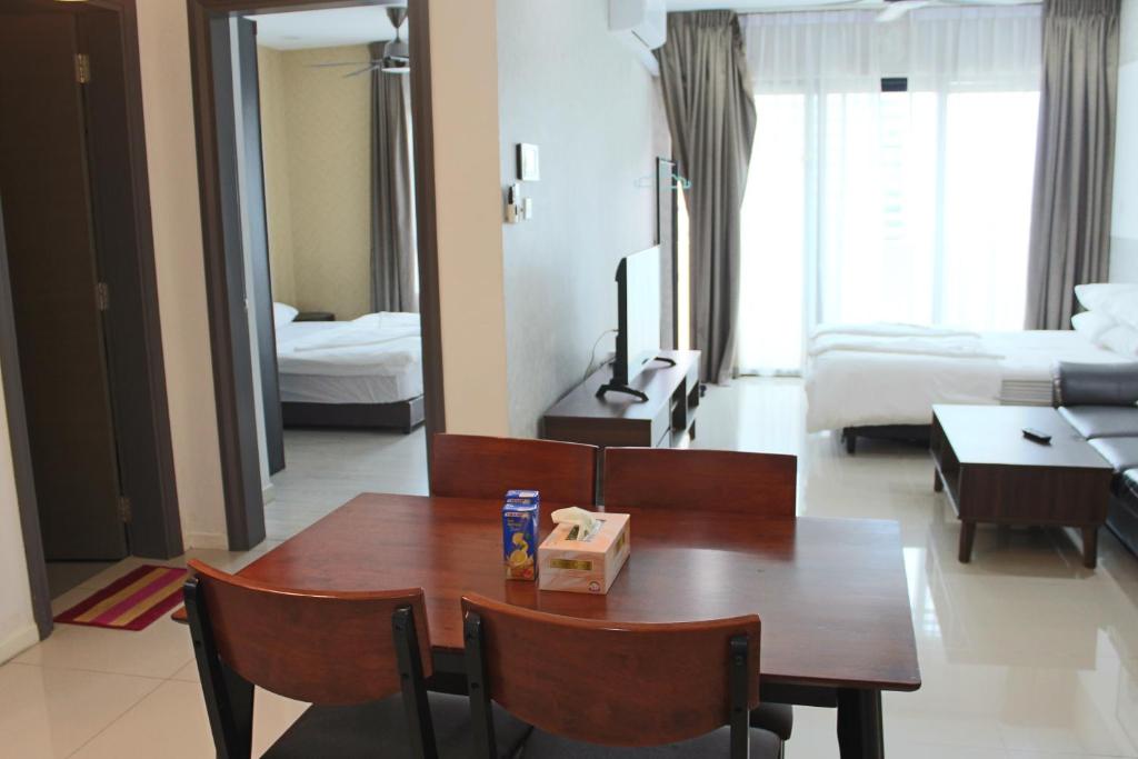 Ένα ή περισσότερα κρεβάτια σε δωμάτιο στο Sausana Suites D' Bliss