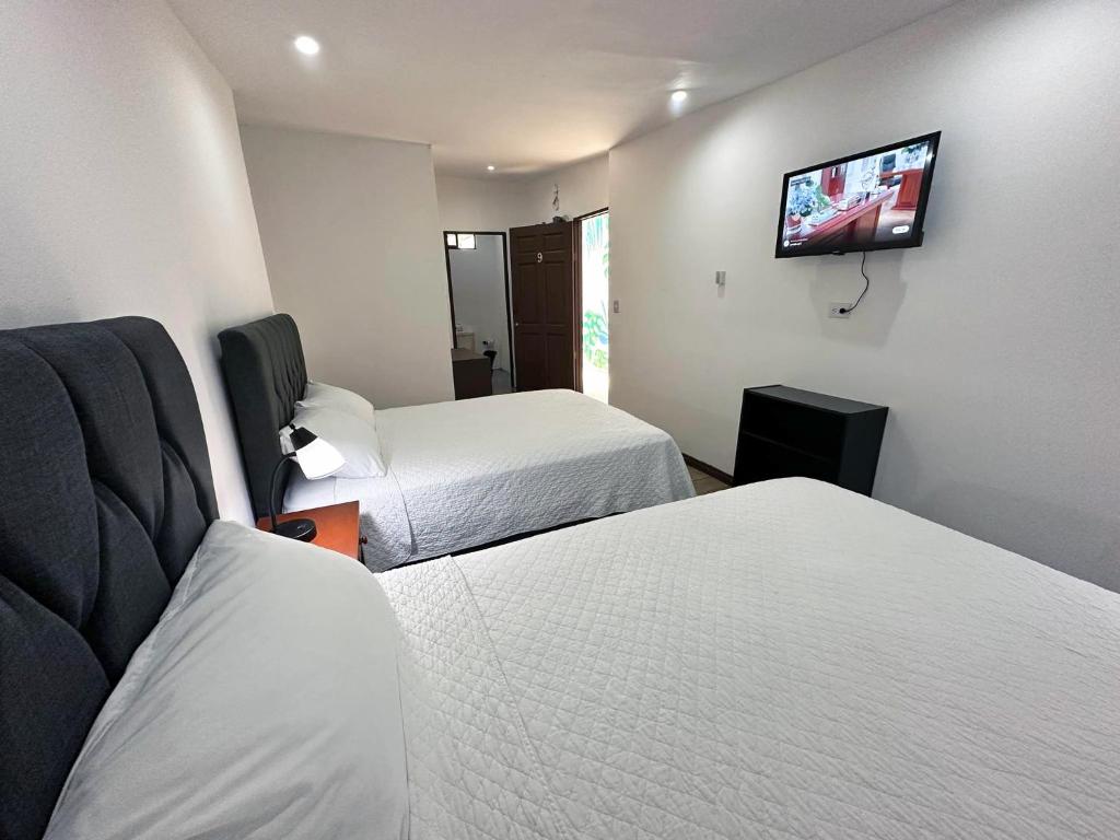 Postel nebo postele na pokoji v ubytování Surf Ranch Tamarindo
