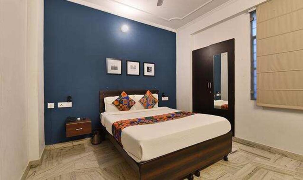 Krevet ili kreveti u jedinici u objektu FabHotel Gangashrey