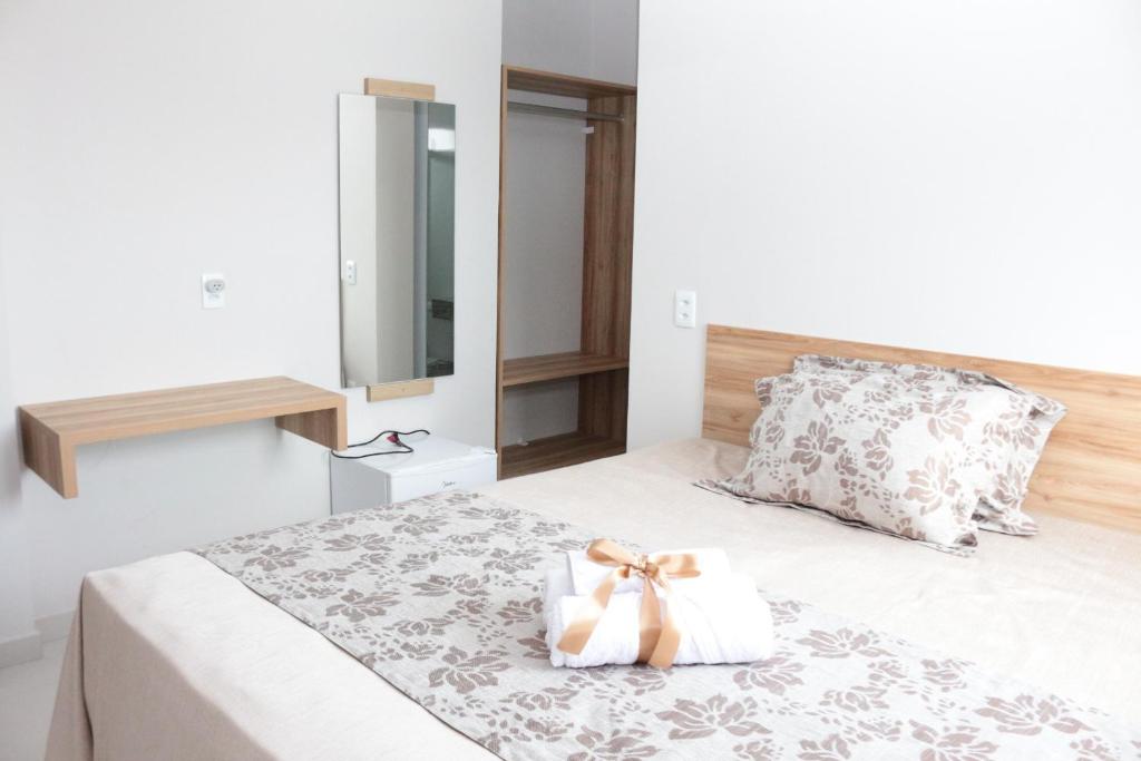Postel nebo postele na pokoji v ubytování LC Palace Hotel