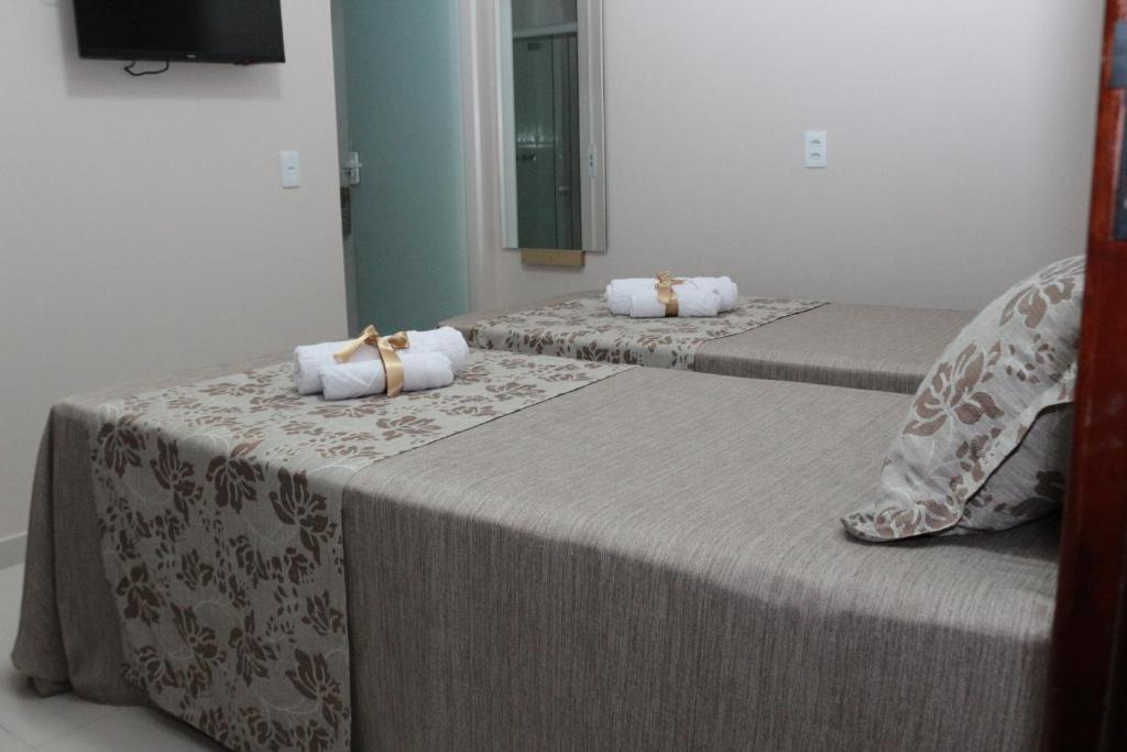 Postel nebo postele na pokoji v ubytování LC Palace Hotel