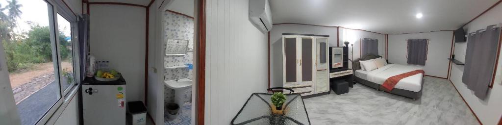 Postel nebo postele na pokoji v ubytování Phuketnumnoi23
