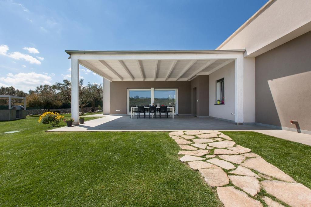 A garden outside Villa Daiana by Perle di Puglia