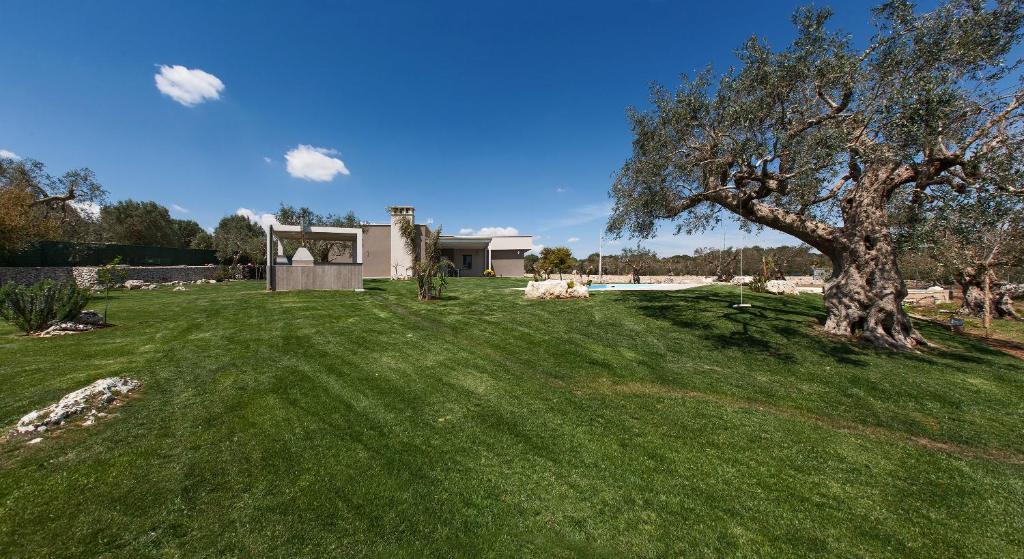 A garden outside Villa Daiana by Perle di Puglia