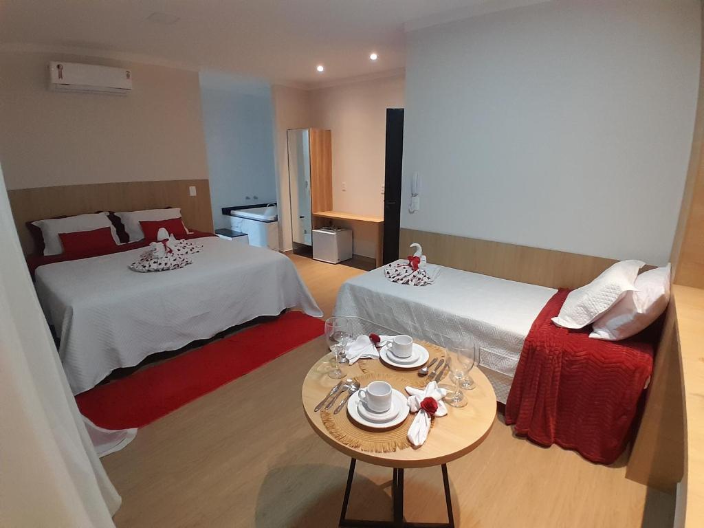 Postel nebo postele na pokoji v ubytování LC Palace Hotel