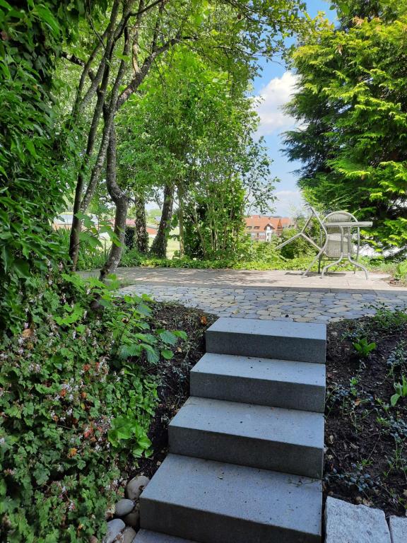 a set of steps with a bench in a park at Ruhepol in Villingen-Schwenningen